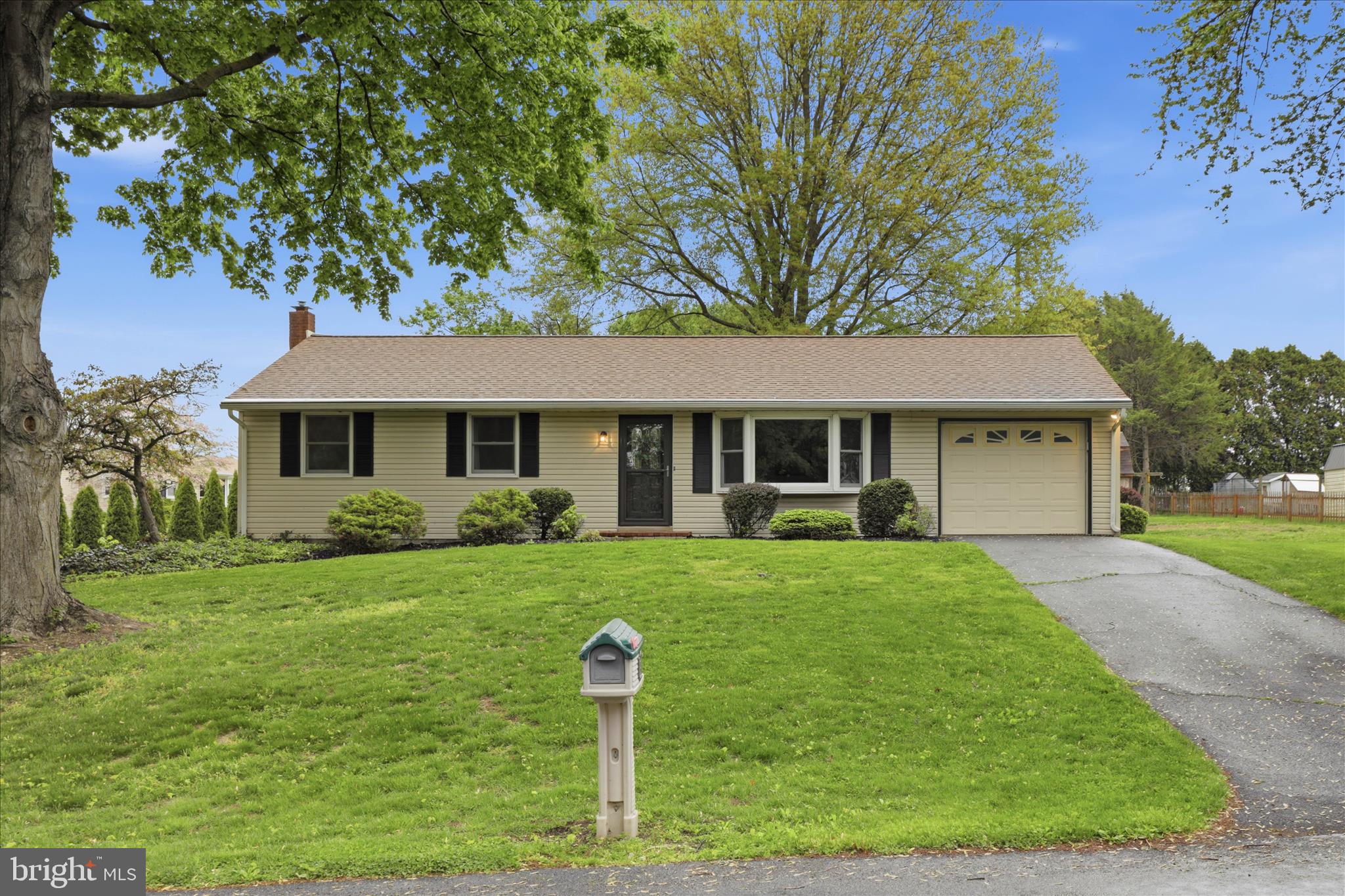 947 Hill Street Manheim, PA 17545 - Photo 40 of 47 a front view of a house with a yard and trees