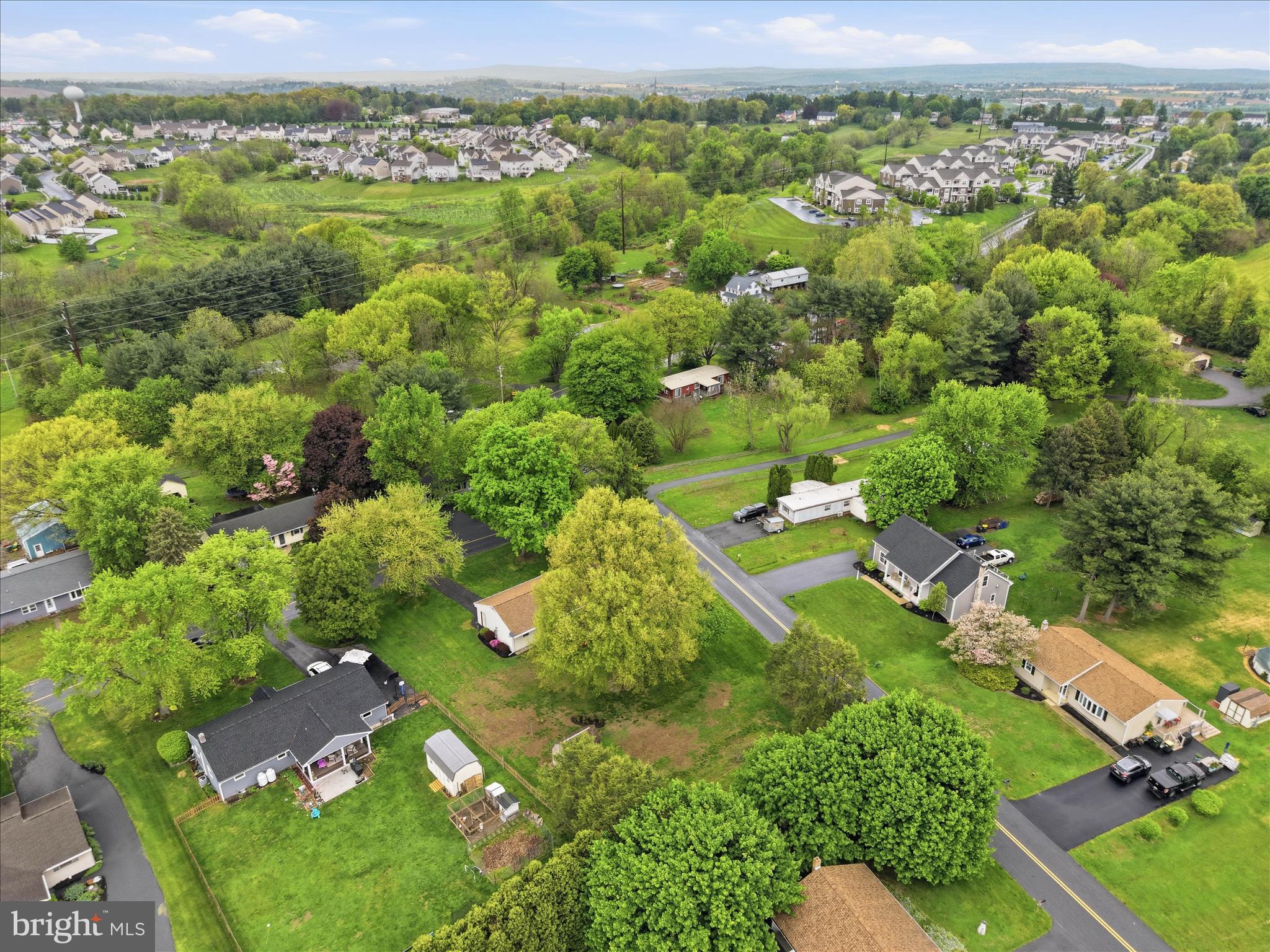 947 Hill Street Manheim, PA 17545 - Photo 45 of 47 an aerial view of a residential houses with outdoor space and trees all around