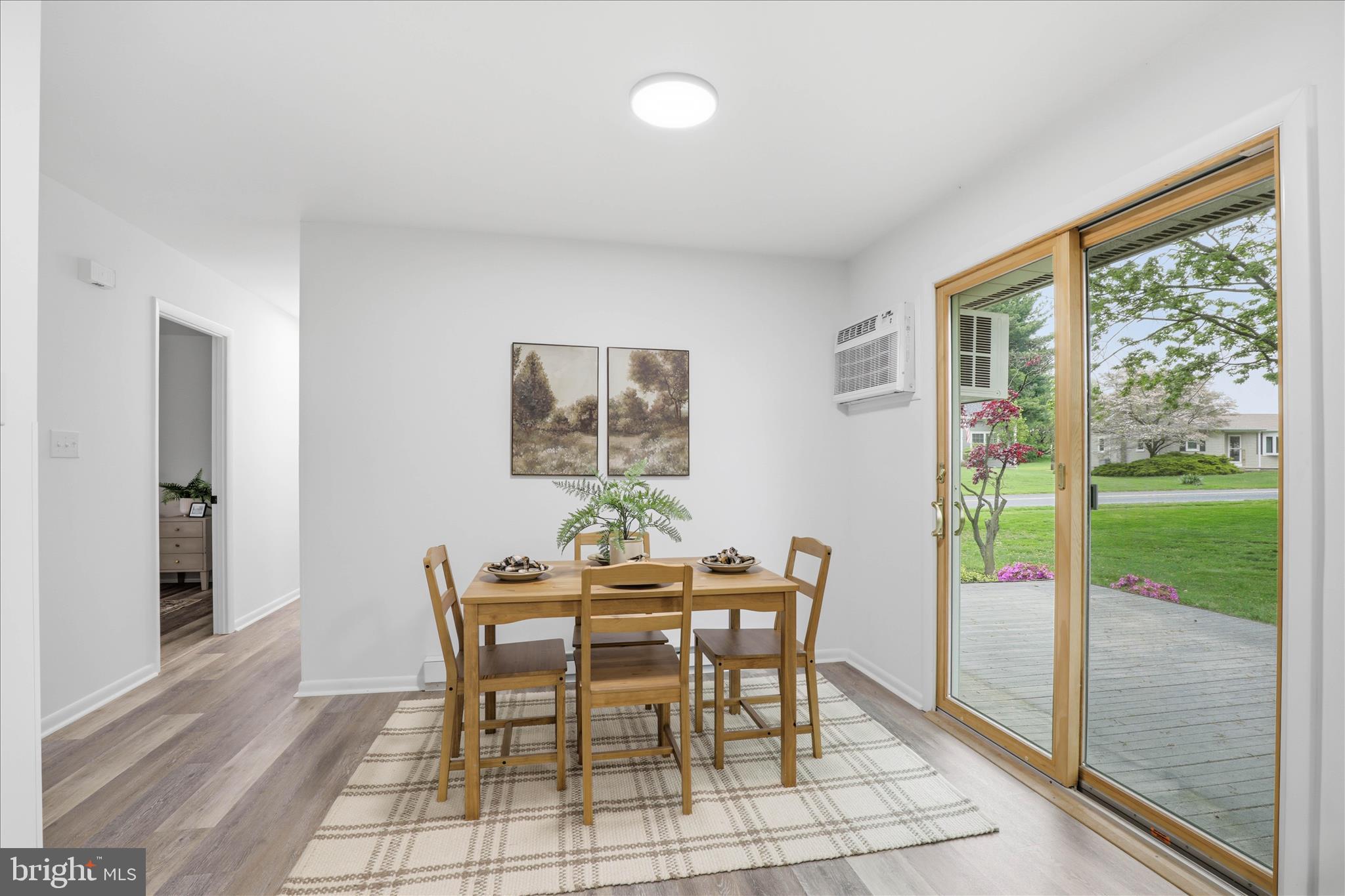 947 Hill Street Manheim, PA 17545 - Photo 9 of 47 a dining room with furniture and a floor to ceiling window