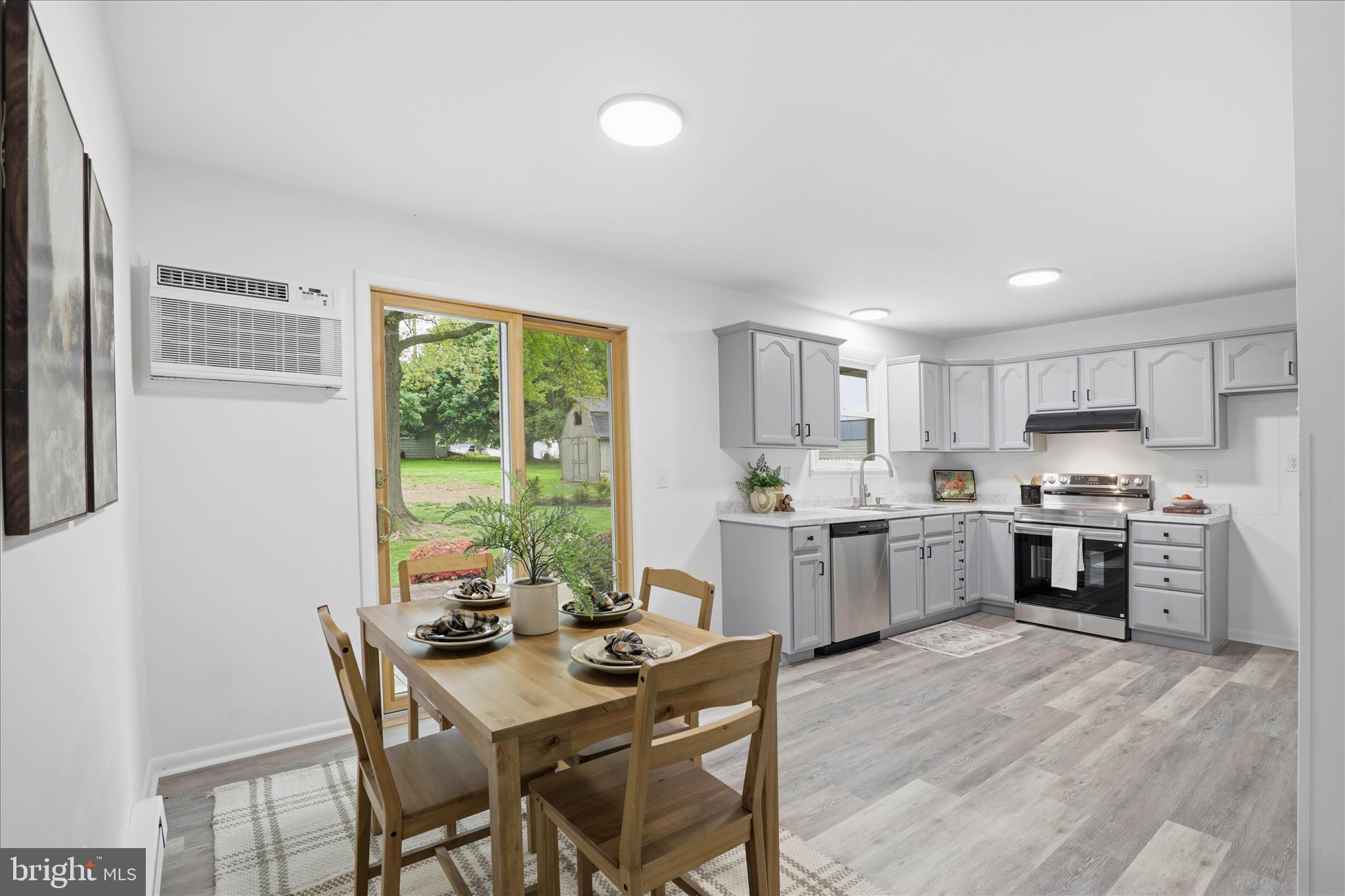 947 Hill Street Manheim, PA 17545 - Photo 10 of 47 a kitchen with a table and chairs in it