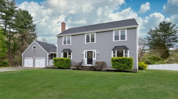 9 Autumn Way Pembroke, MA 02359 - Photo 1 of 42 a front view of house with yard and green space