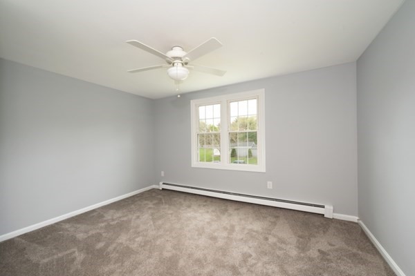 9 Autumn Way Pembroke, MA 02359 - Photo 20 of 42 an empty room with a window