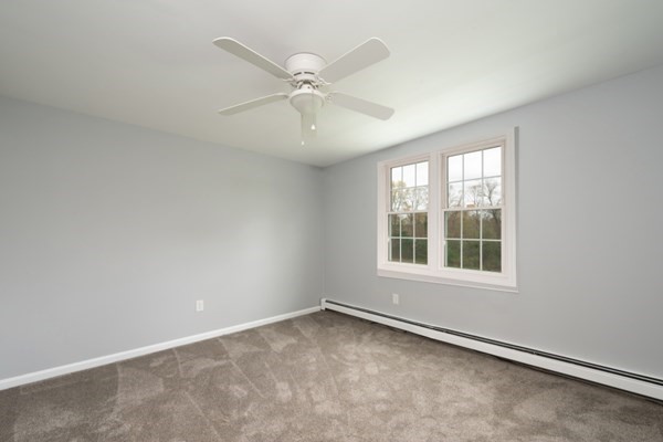 9 Autumn Way Pembroke, MA 02359 - Photo 23 of 42 an empty room with a window