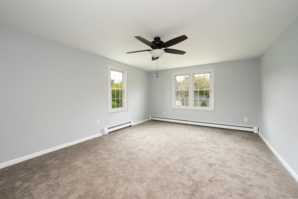 9 Autumn Way Pembroke, MA 02359 - Photo 27 of 42 a view of an empty room with a window