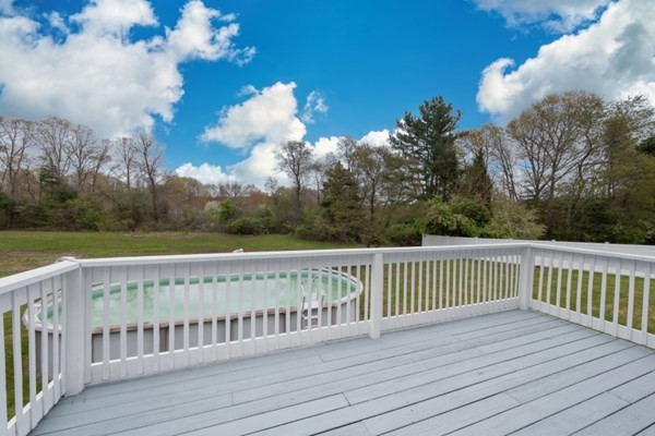 9 Autumn Way Pembroke, MA 02359 - Photo 5 of 42 a view of a wooden deck