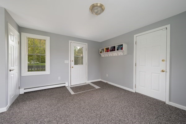 9 Autumn Way Pembroke, MA 02359 - Photo 6 of 42 an empty room with windows