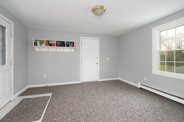 9 Autumn Way Pembroke, MA 02359 - Photo 7 of 42 an empty room with windows