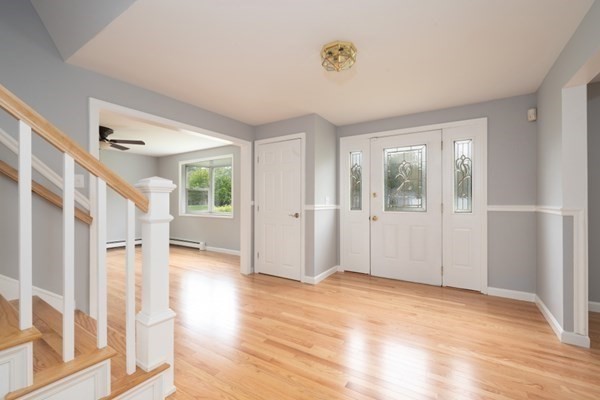 9 Autumn Way Pembroke, MA 02359 - Photo 8 of 42 wooden floor in an empty room