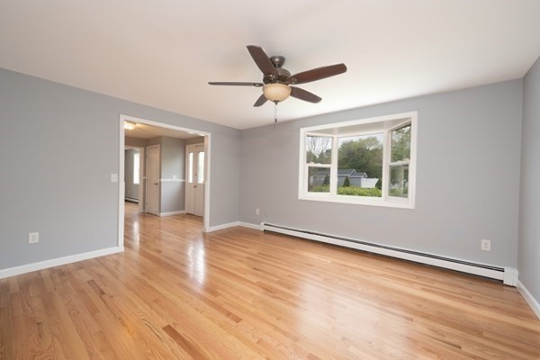 9 Autumn Way Pembroke, MA 02359 - Photo 10 of 42 wooden floor in an empty room with a window
