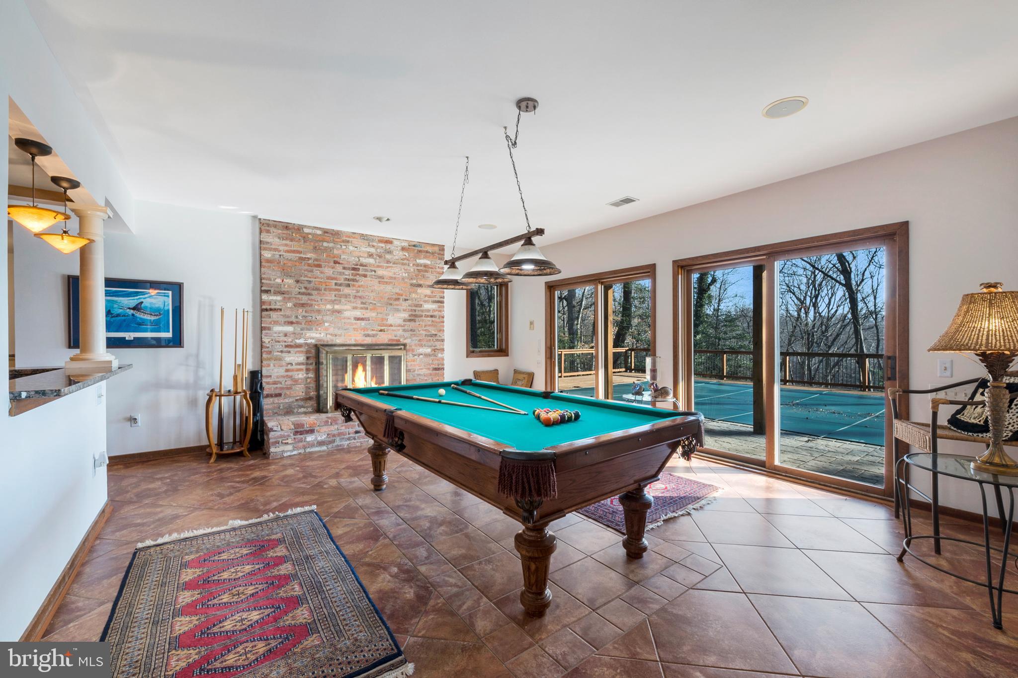 554 Maynadier Lane Crownsville, MD 21032 - Photo 14 of 68 Fully finished walk out LL w/ wood burning FP