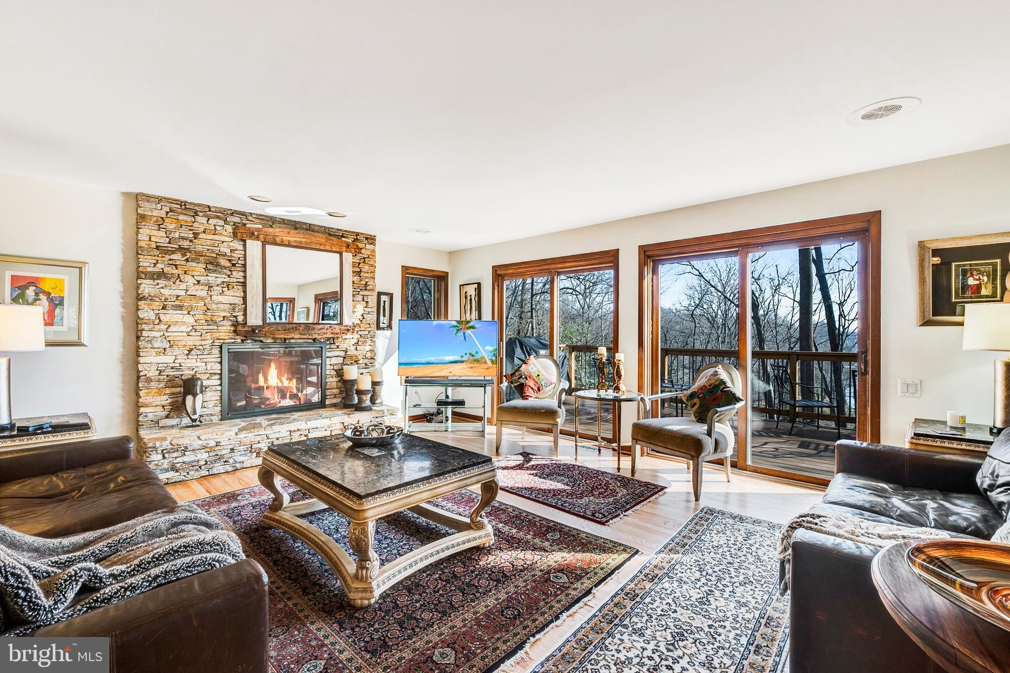 554 Maynadier Lane Crownsville, MD 21032 - Photo 4 of 68 Cozy family room w/ wood burning FP opens to deck