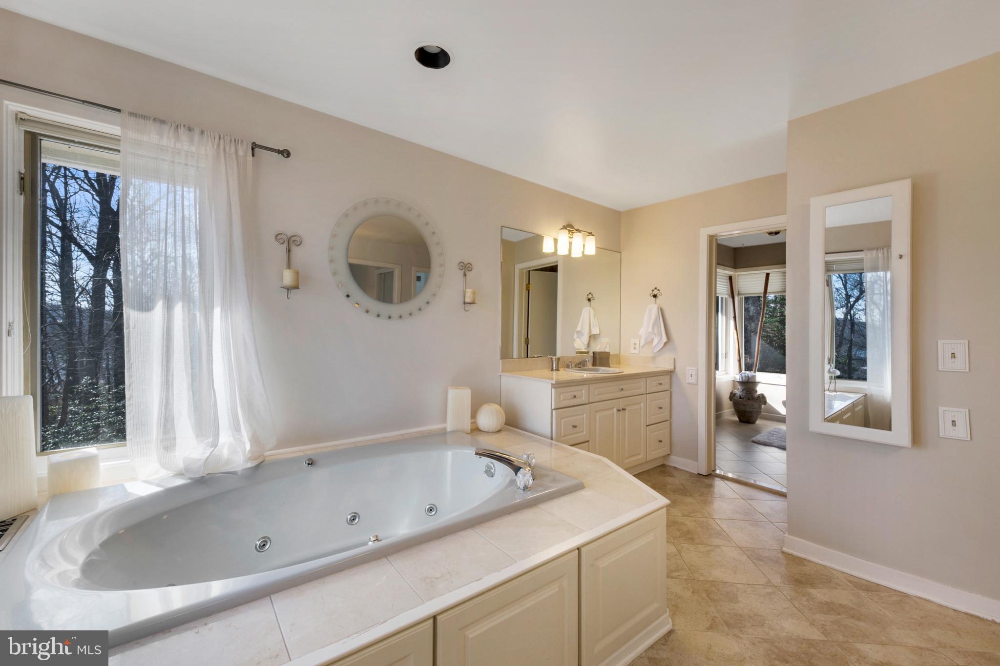 554 Maynadier Lane Crownsville, MD 21032 - Photo 38 of 68 His and hers vanities in master bath/heat lamp