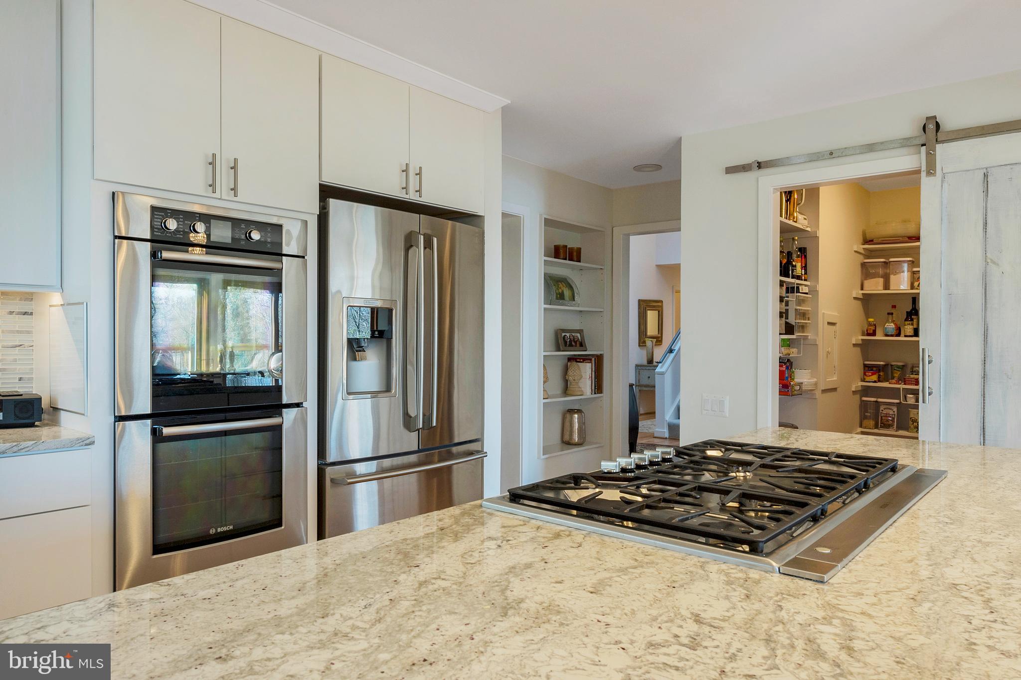 554 Maynadier Lane Crownsville, MD 21032 - Photo 52 of 68 Thermador/Bosch gas cooktop