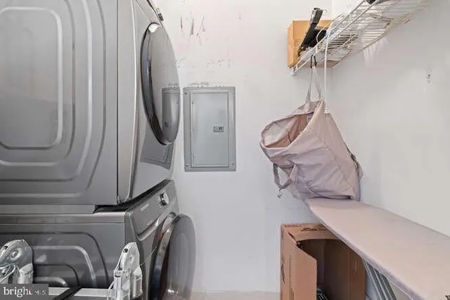 a bathroom with a sink a mirror and shower