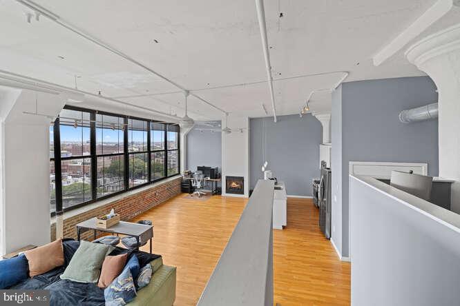 314 North 12th Street, Unit 1004 Philadelphia, PA 19107 - Photo 4 of 16 a view of a living room with furniture and floor to ceiling window