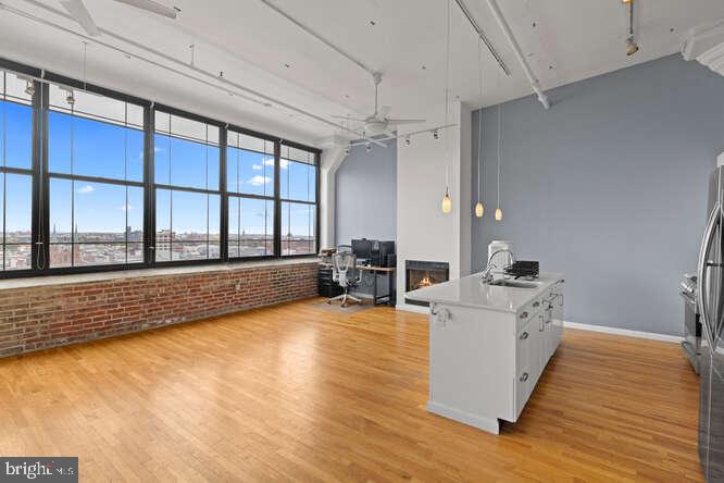 314 North 12th Street, Unit 1004 Philadelphia, PA 19107 - Photo 6 of 16 a large white kitchen with a large window