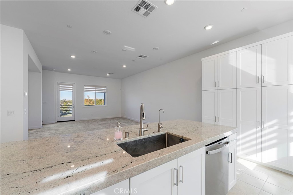 398 Merit Irvine, CA 92618 - Photo 16 of 55 a view of a kitchen sink and a window