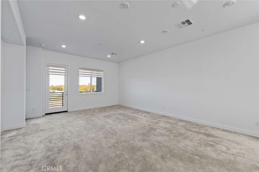 398 Merit Irvine, CA 92618 - Photo 17 of 55 an empty room with windows