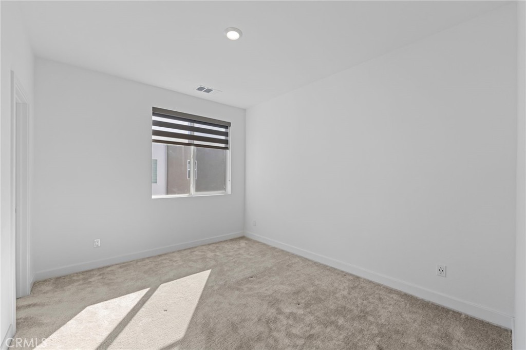 398 Merit Irvine, CA 92618 - Photo 29 of 55 an empty room with windows