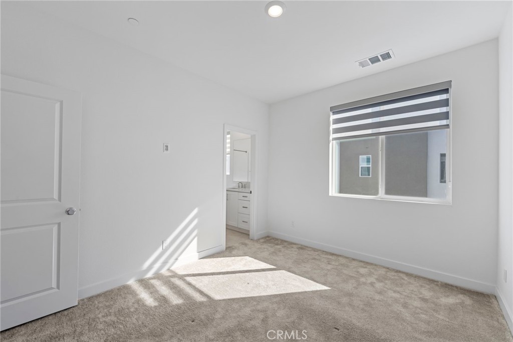 398 Merit Irvine, CA 92618 - Photo 30 of 55 a view of livingroom with hardwood floor and cabinet