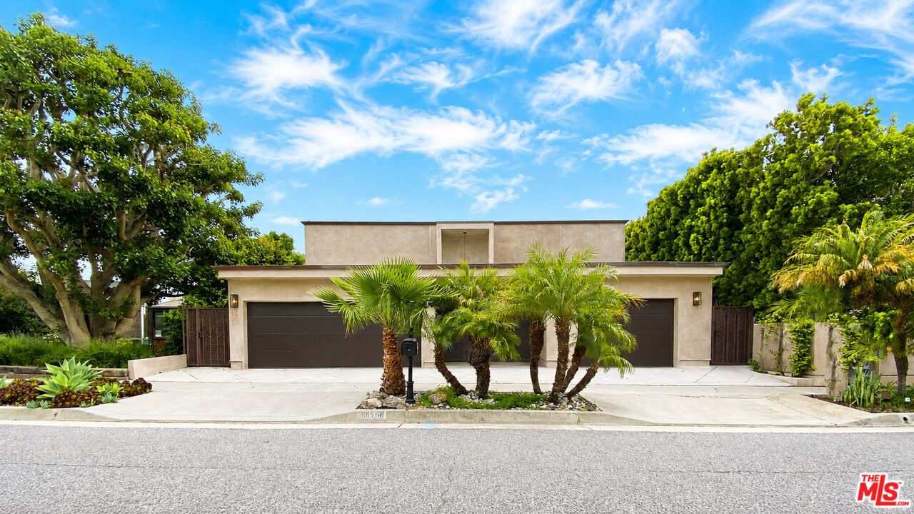 front view of a house with a street