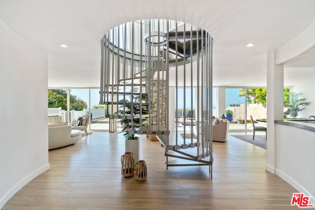31518 Broad Beach Road Malibu, CA 90265 - Photo 11 of 27 a view of entryway and livingroom with wooden floor