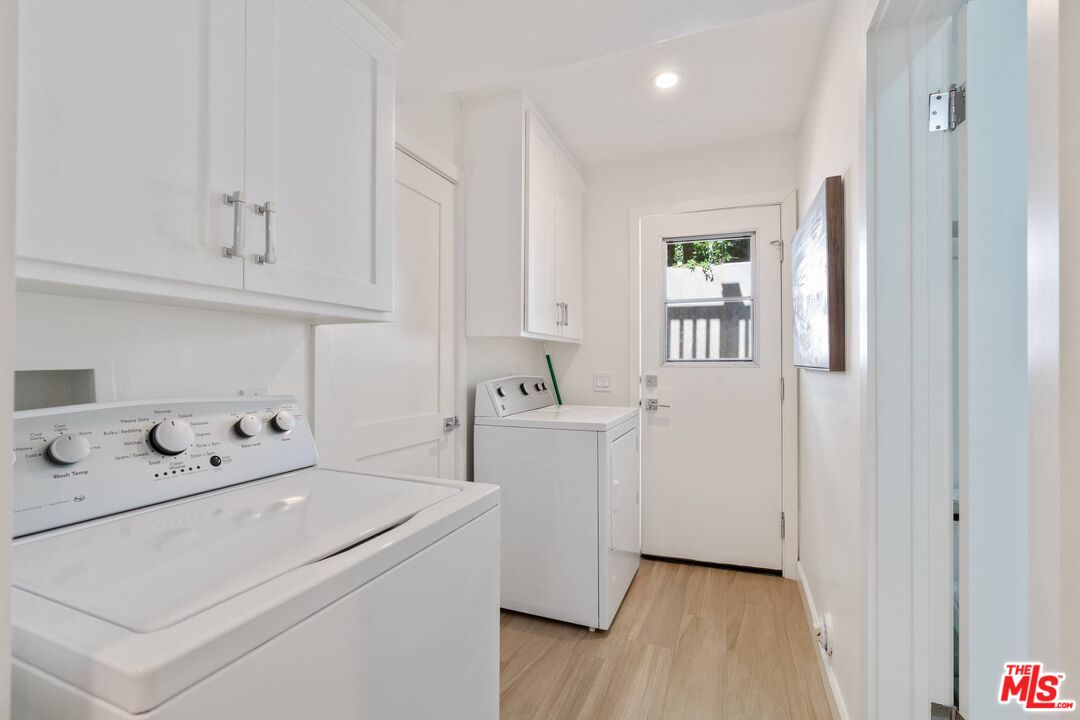 31518 Broad Beach Road Malibu, CA 90265 - Photo 23 of 27 a view of utility room with washer and dryer