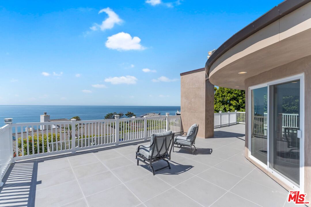 31518 Broad Beach Road Malibu, CA 90265 - Photo 3 of 27 a view of a terrace with furniture
