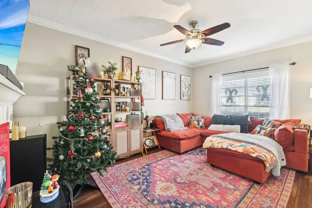 a bedroom with bed and a window