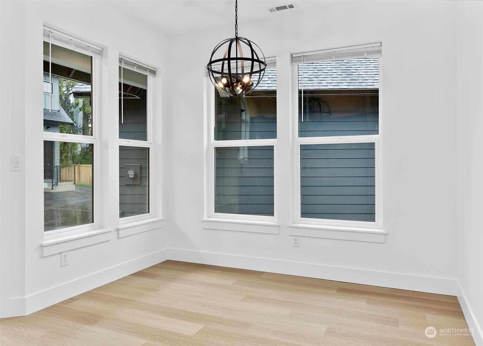 22713 1st Place West Bothell, WA 98021 - Photo 11 of 29 a view of wooden floor in a room