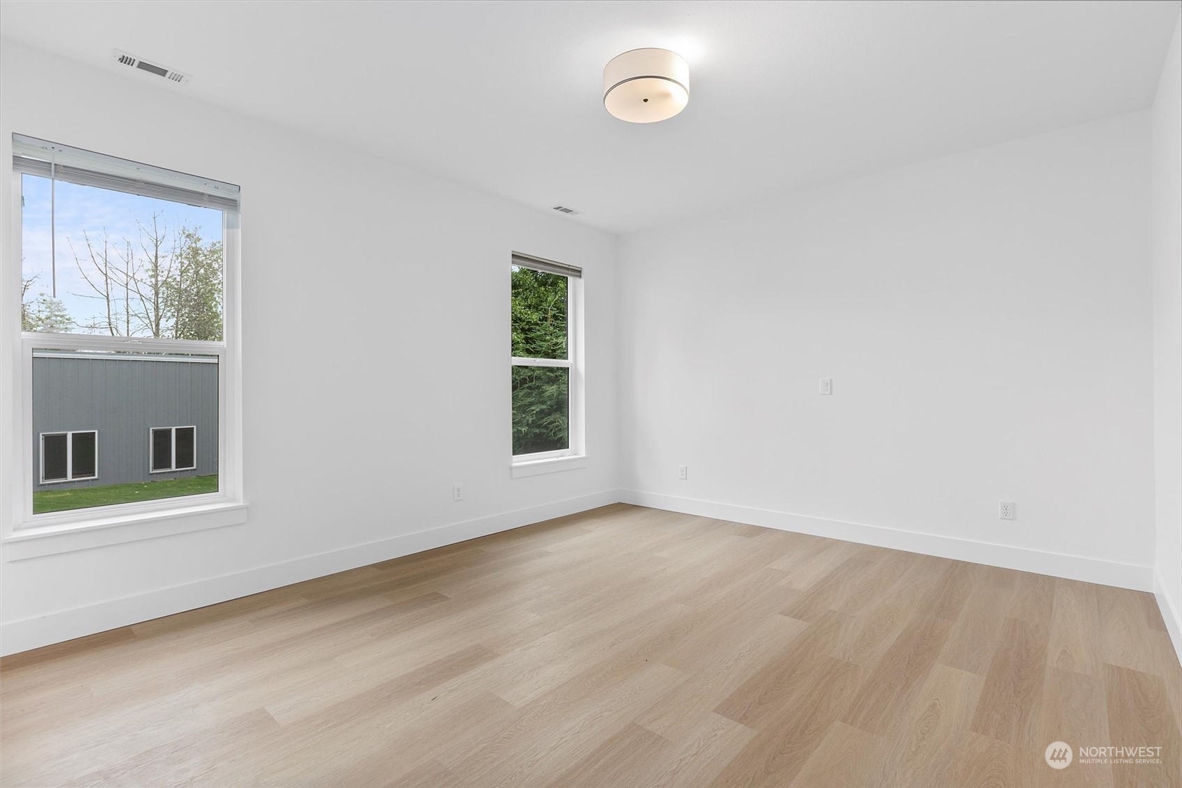 22713 1st Place West Bothell, WA 98021 - Photo 13 of 29 an empty room with a window