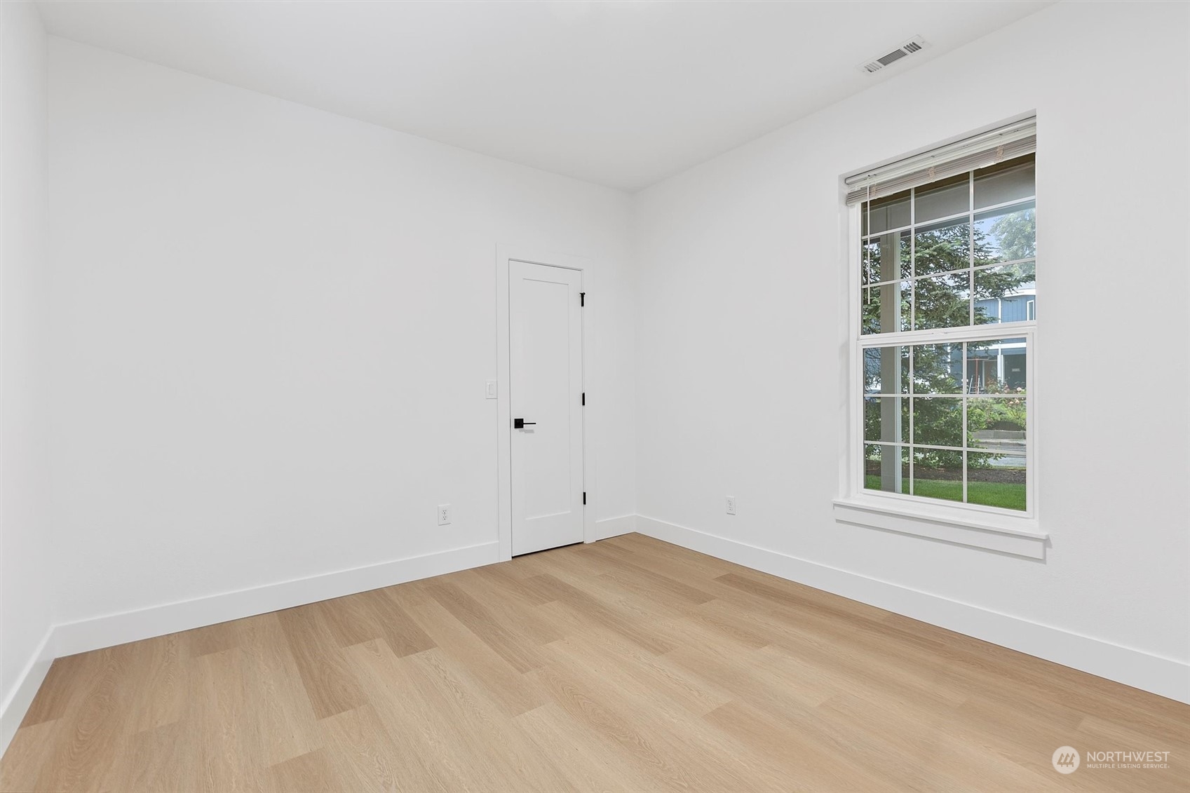 22713 1st Place West Bothell, WA 98021 - Photo 18 of 29 an empty room with a window