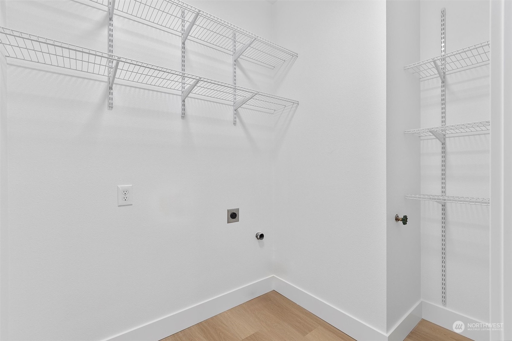 22713 1st Place West Bothell, WA 98021 - Photo 21 of 29 a view of a room with racks on the wall