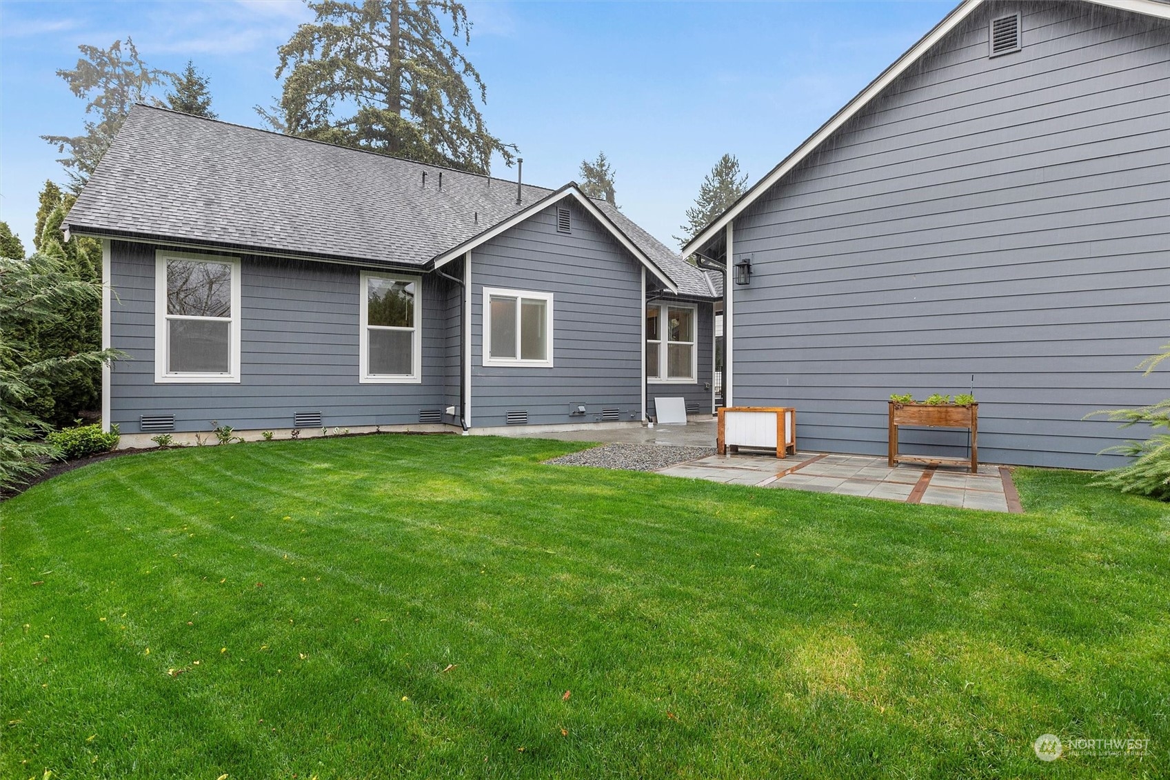 22713 1st Place West Bothell, WA 98021 - Photo 25 of 29 a backyard of a house with seating space