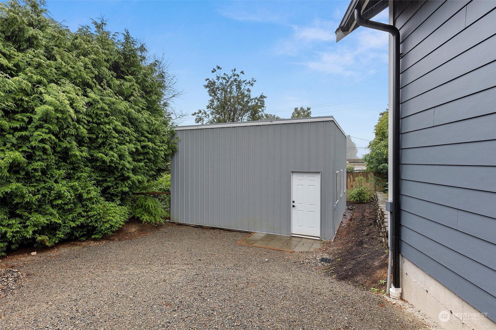 22713 1st Place West Bothell, WA 98021 - Photo 27 of 29 a backyard of a house with lots of green space