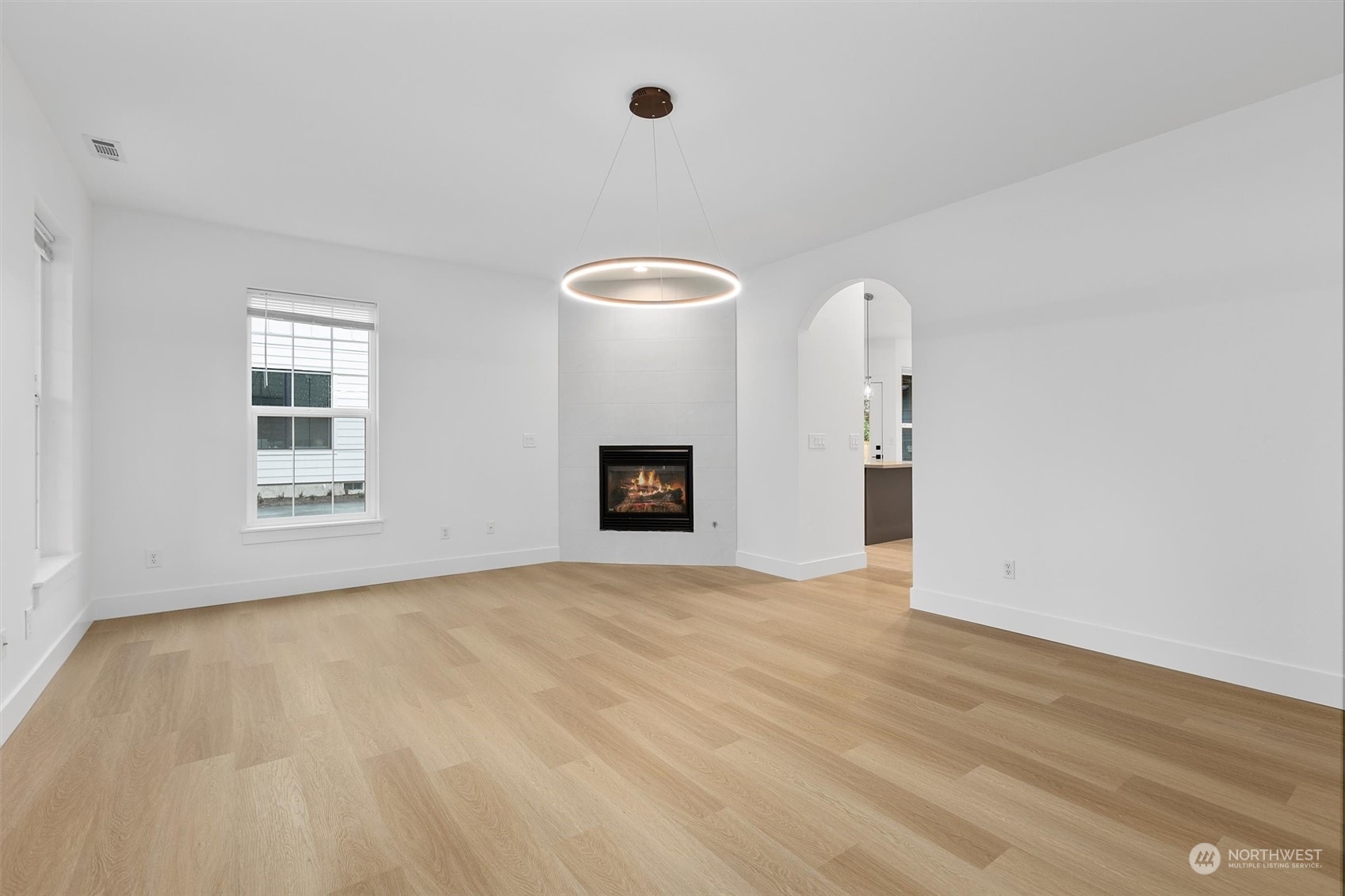 22713 1st Place West Bothell, WA 98021 - Photo 3 of 29 a view of an empty room with a window