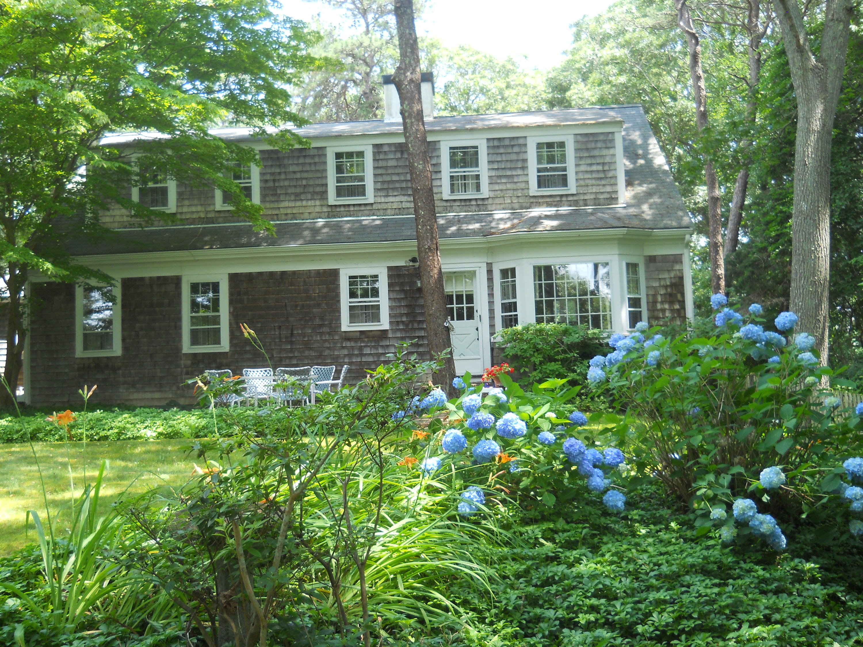 87 Eel River Road Osterville, MA 02655 - Photo 14 of 29 front view of a house with a yard