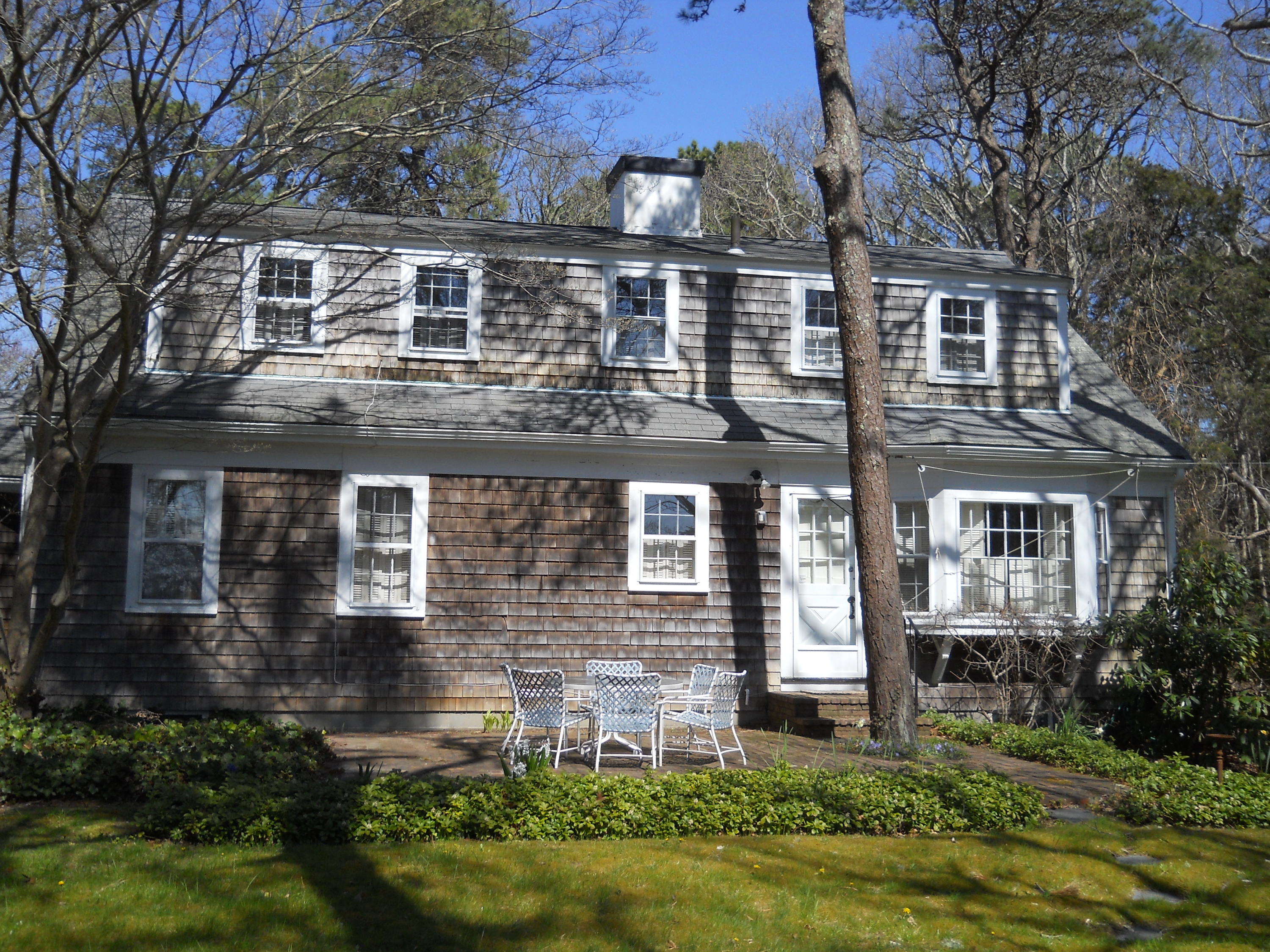 87 Eel River Road Osterville, MA 02655 - Photo 16 of 29 front view of house with a yard