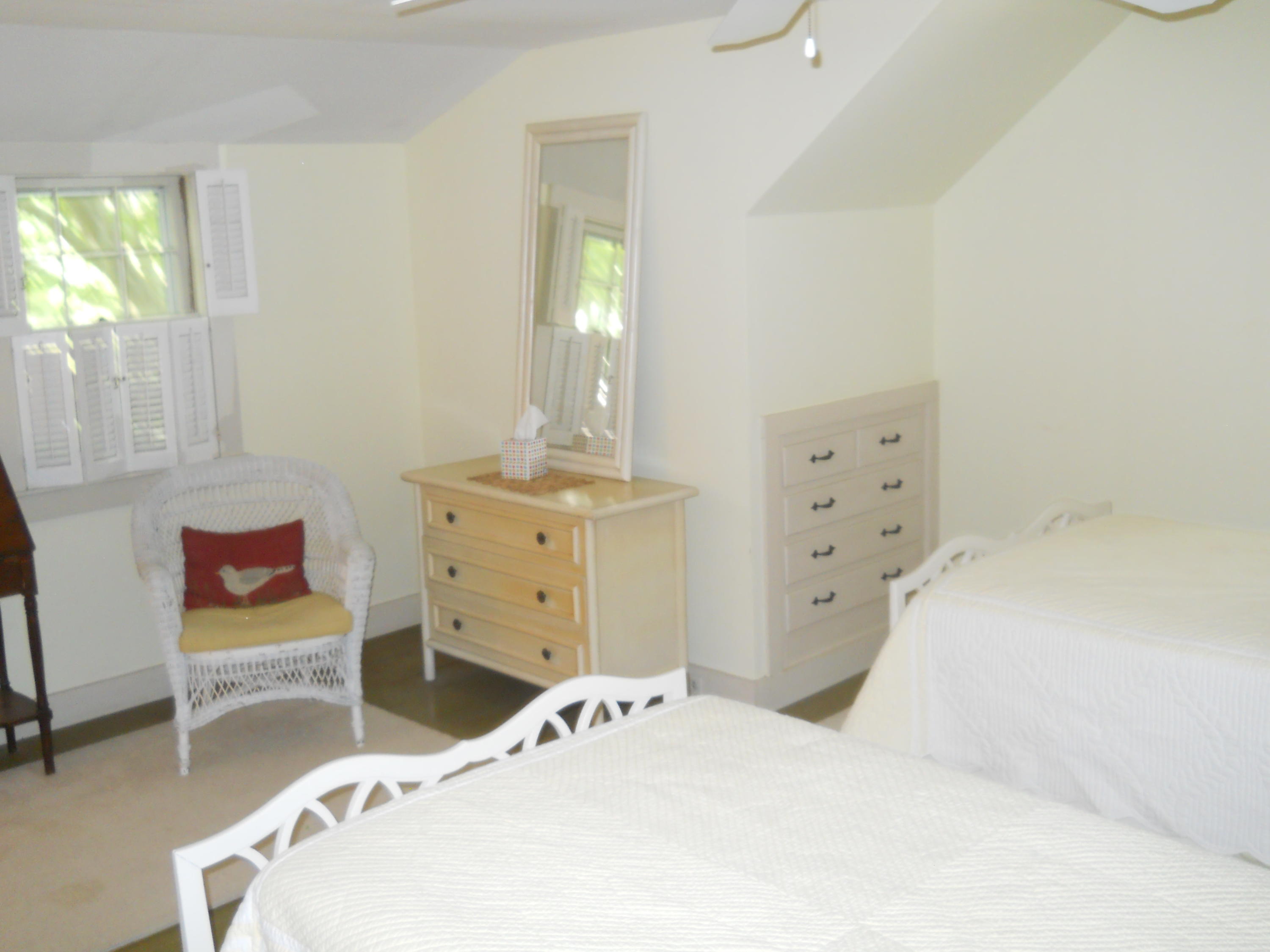 87 Eel River Road Osterville, MA 02655 - Photo 25 of 29 a bedroom with a bed and a dresser