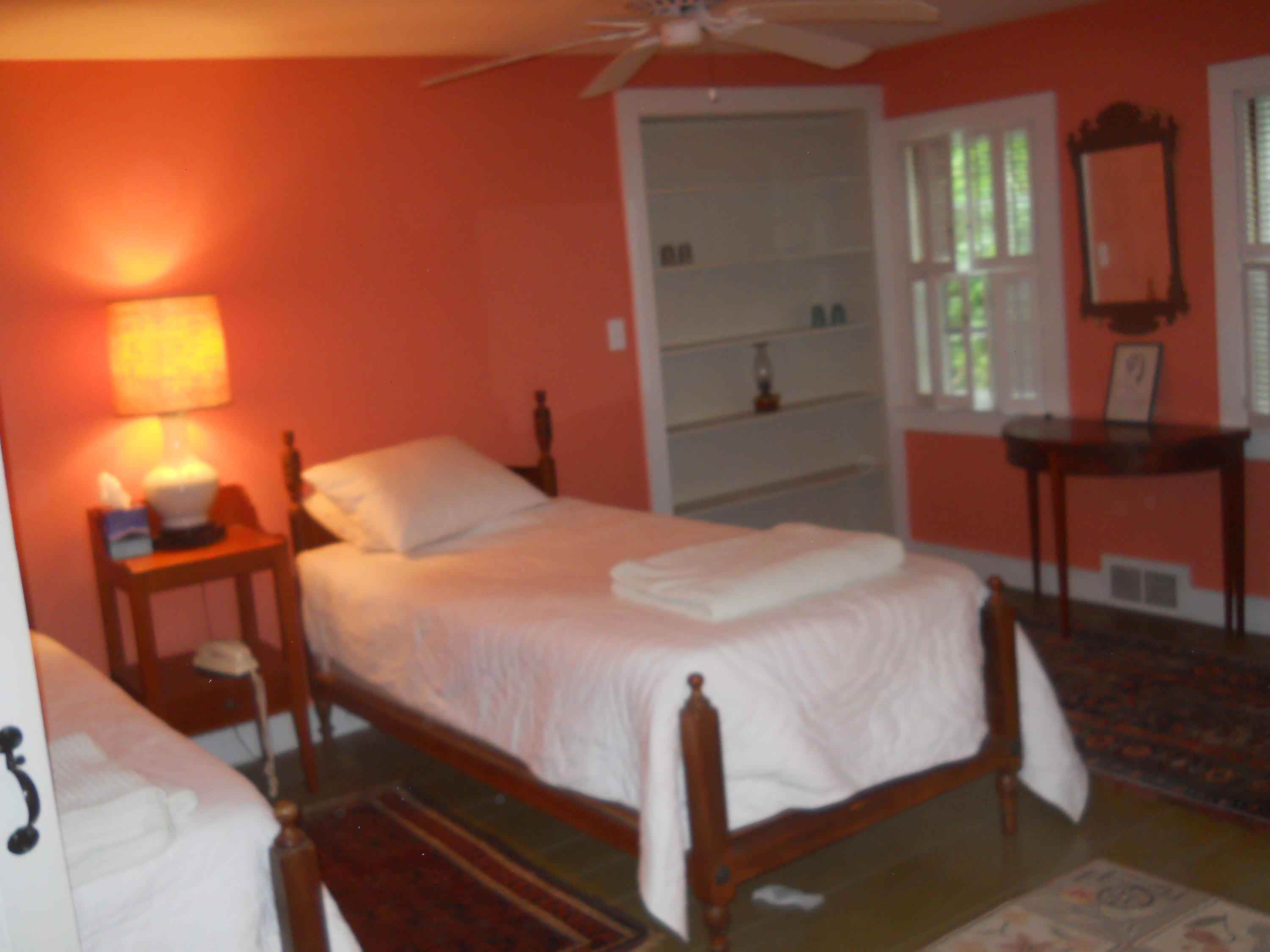 87 Eel River Road Osterville, MA 02655 - Photo 26 of 29 a bedroom with a bed and a window