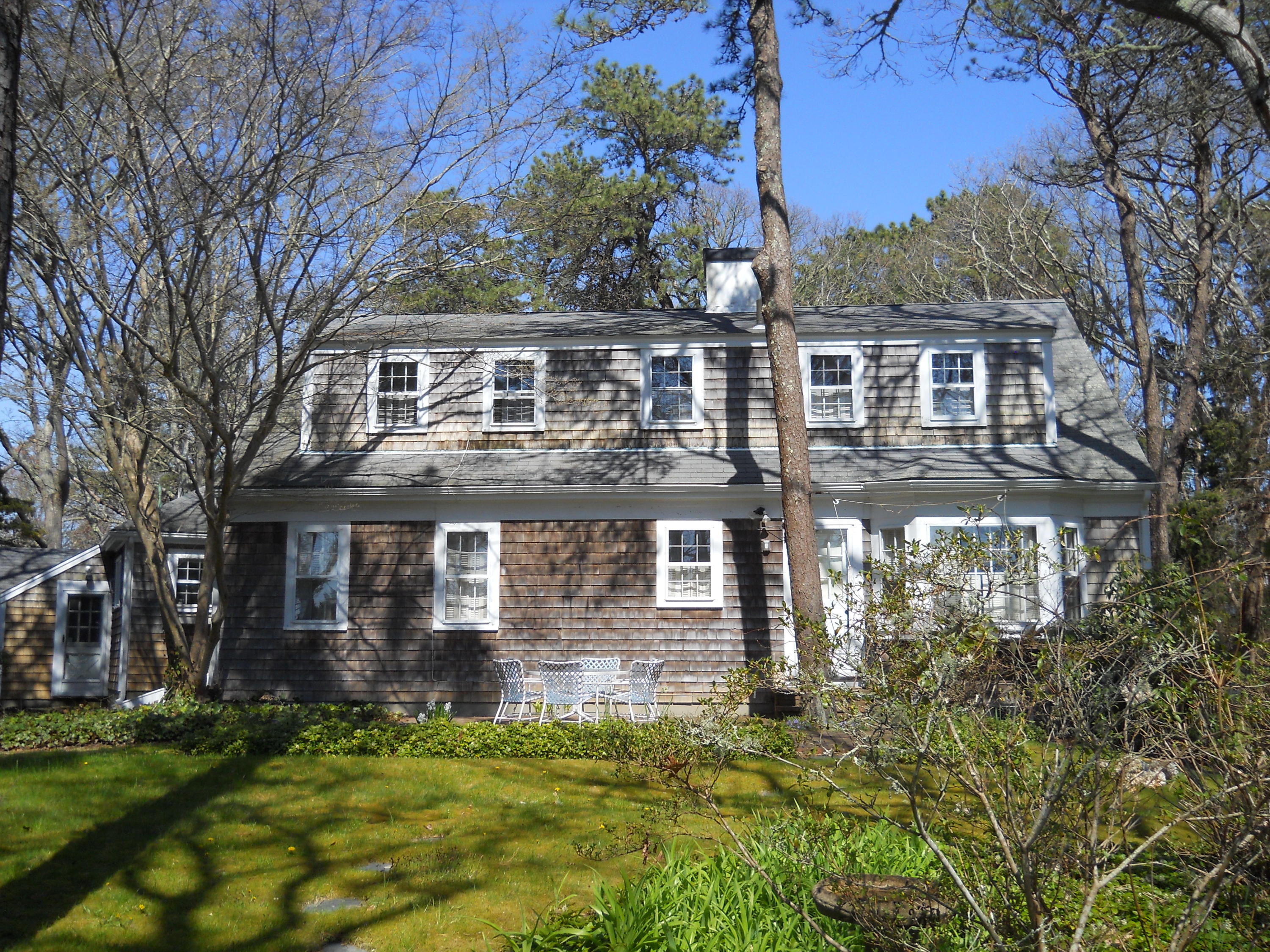 87 Eel River Road Osterville, MA 02655 - Photo 5 of 29 front view of a house with a yard
