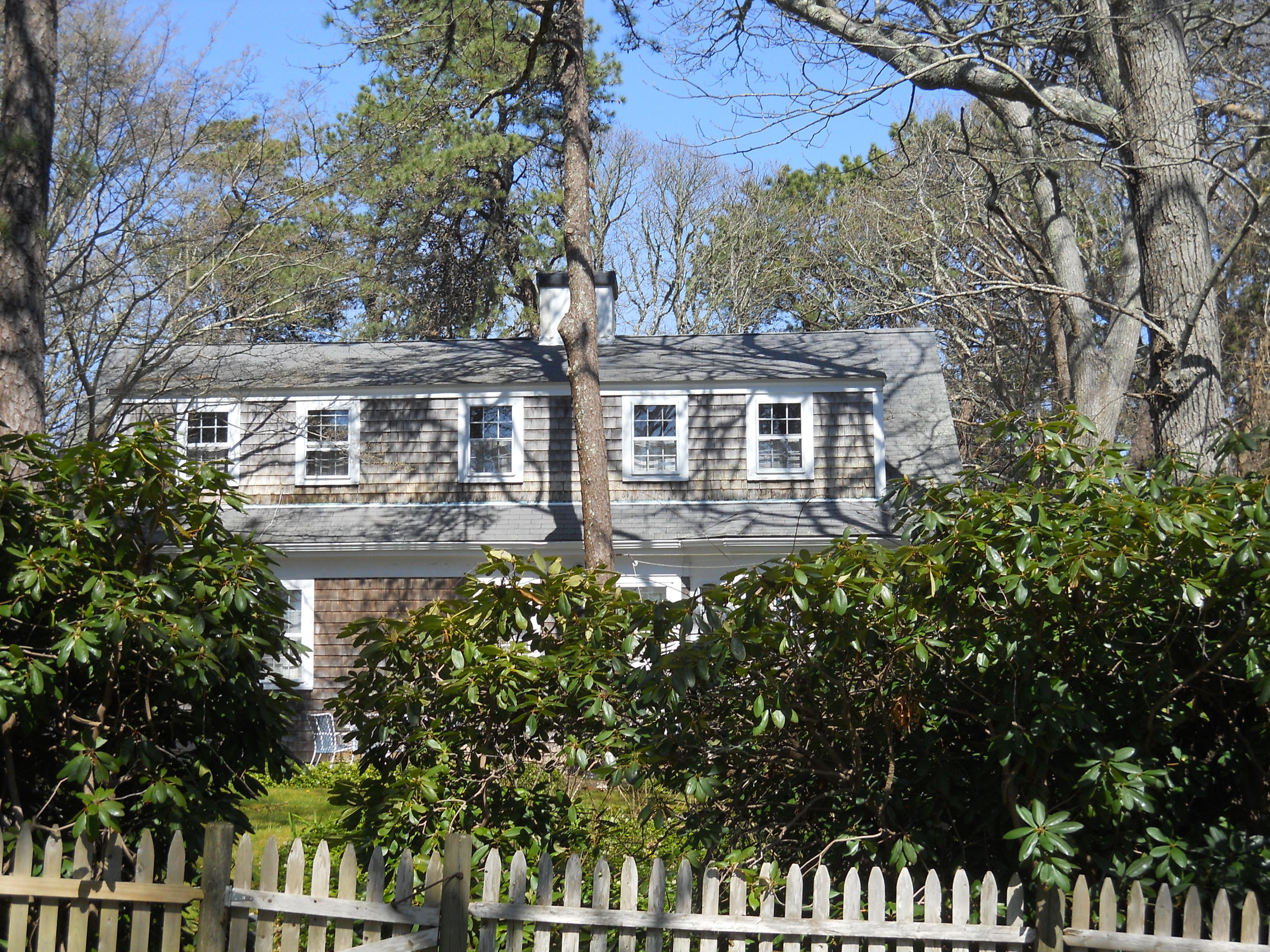 87 Eel River Road Osterville, MA 02655 - Photo 6 of 29 front view of a house with a tree