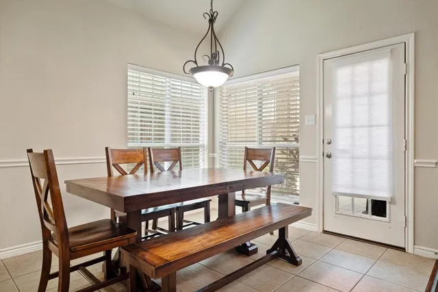 a living room with furniture fireplace and flat screen tv