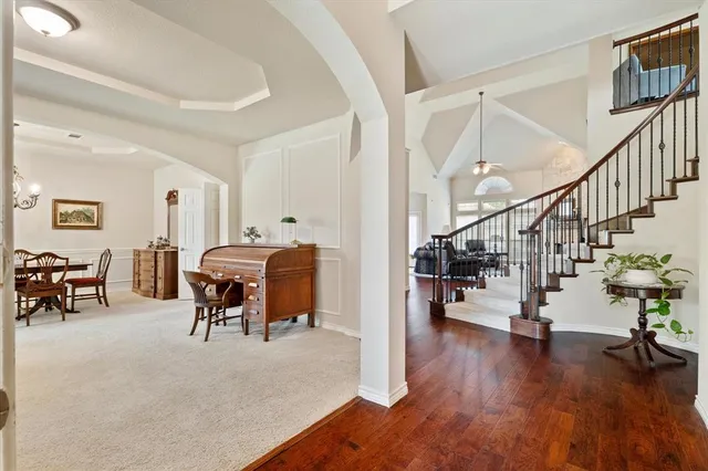 a living room with furniture and a table