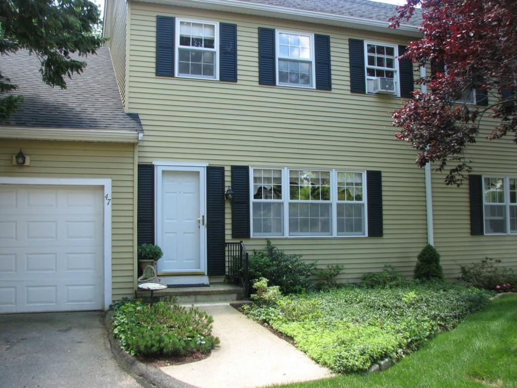 47 Wilshire Road, Unit 47 Madison, CT 06443 - Photo 1 of 1 a view front of house with a yard