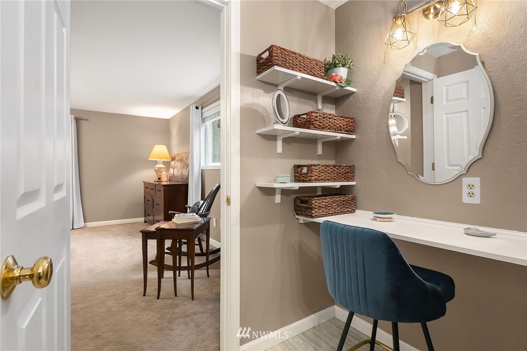 18207 Southeast 147th Street Renton, WA 98059 - Photo 14 of 23 a workspace with furniture and a mirror