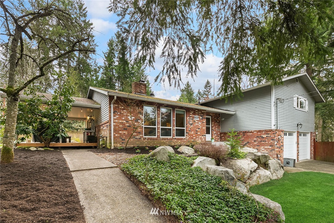 18207 Southeast 147th Street Renton, WA 98059 - Photo 23 of 23 a front view of a house with garden
