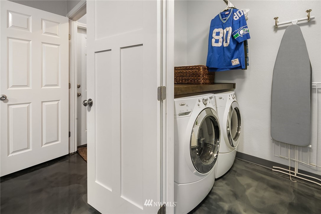 18207 Southeast 147th Street Renton, WA 98059 - Photo 10 of 23 a utility room with dryer and washer