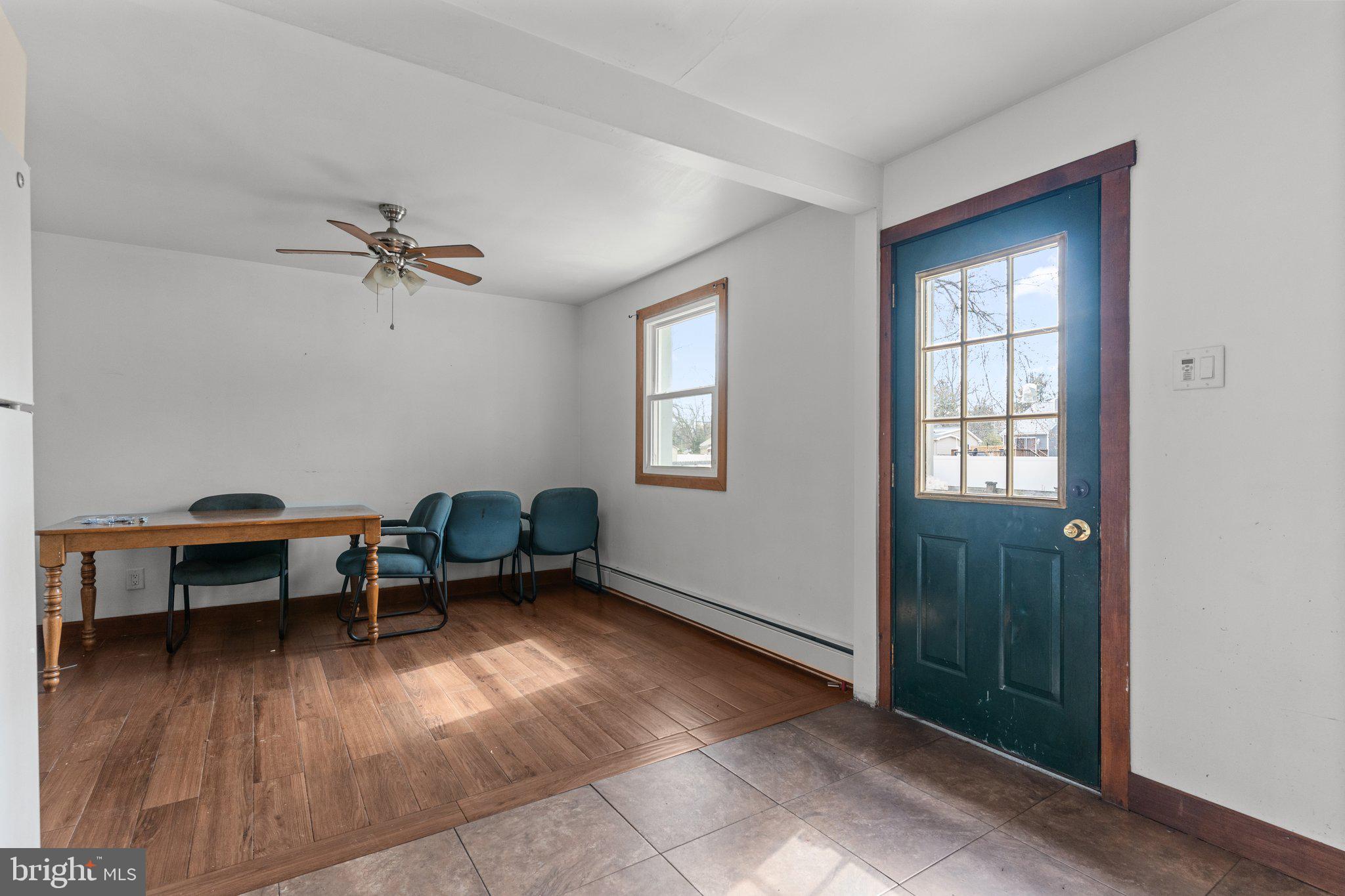 52 East 9th Avenue Pine Hill, NJ 08021 - Photo 14 of 25 a view of a workspace with furniture and a window