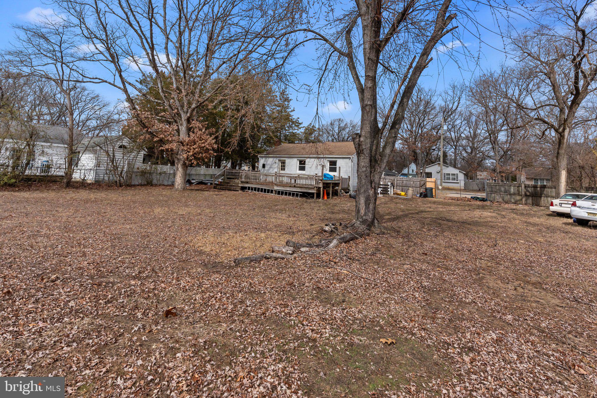 52 East 9th Avenue Pine Hill, NJ 08021 - Photo 19 of 25 a street view with residential house